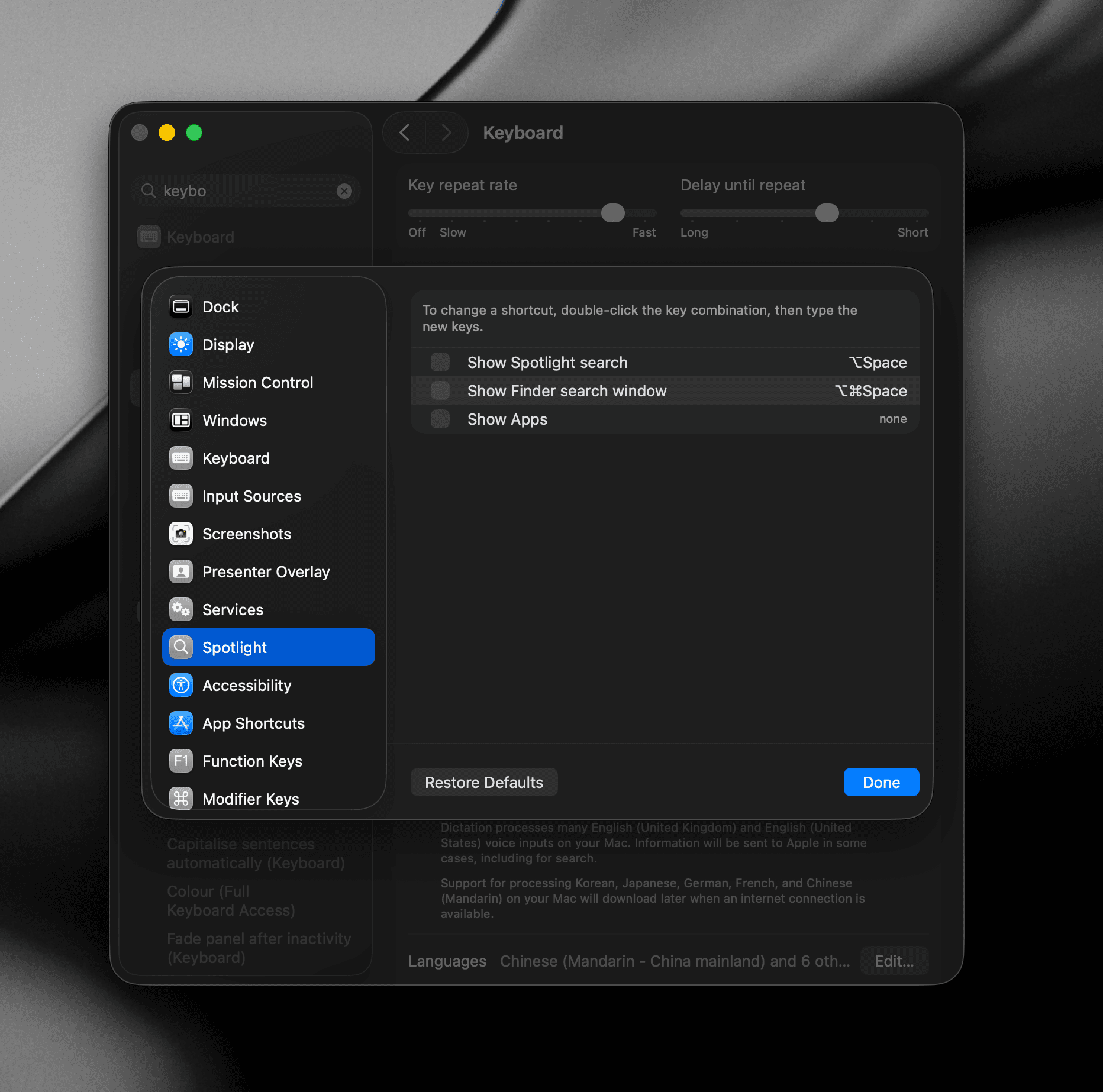 Screenshot of System Settings showing the Spotlight keyboard shortcut being turned off